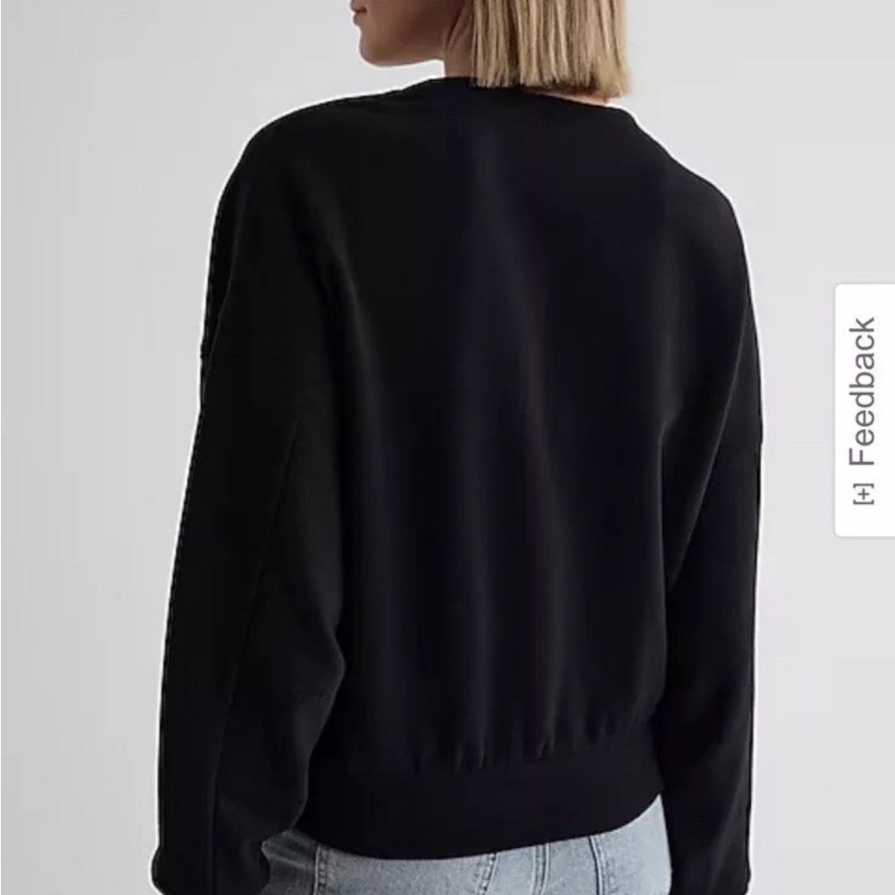 Chic Black Sweater with Floral Accents - Picture 4 of 6